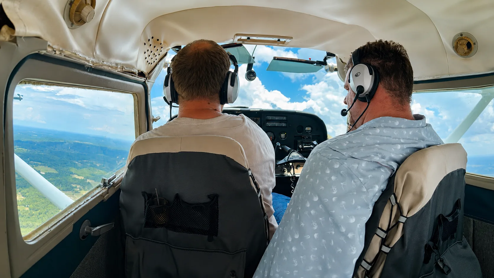 Instructor and pilot flying together in a general aviation aircraft