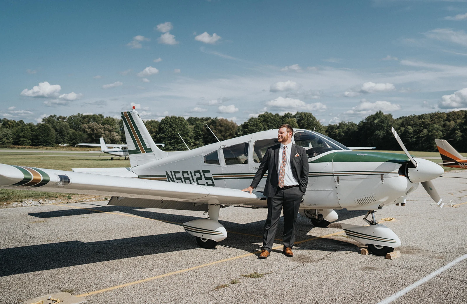 Jonathan Wieting standing beside a general aviation aircraft